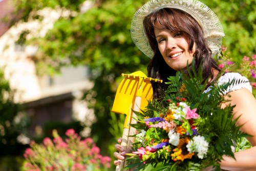 Photo of a gardener working in a Sidcup garden with clear pathways
